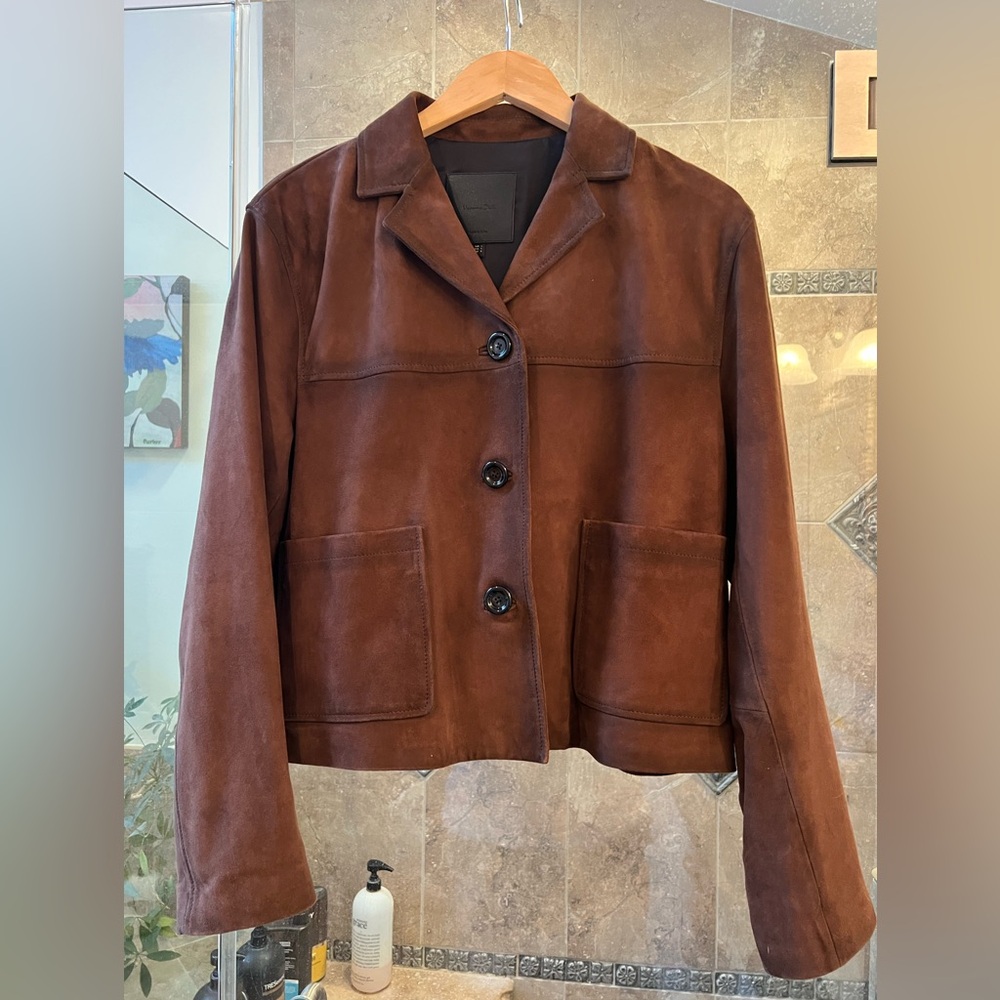 Gorgeous brown suede jacket fully lined.